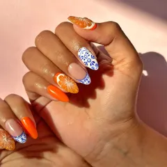 Bring me your inspiration and I'll make it happen. This set was inspired by Mediterranean tile art, featuring hand-painted blue and white patterns paired with juicy, 3D sculpted orange slices for a perfect summer vibe.