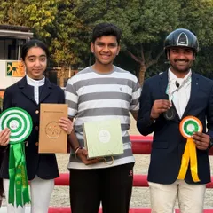 Members of Team VEA proudly display their medals and ribbons. The smiles on their faces reflect the joy and sense of accomplishment we strive for.