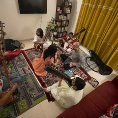 Another angle from our special Bijoya gathering. The informal setting of a home allows for a relaxed and comfortable learning environment, which is very important in the Guru-Shishya tradition.