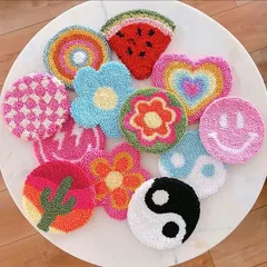Just look at this vibrant collection of punch needle coasters made by beginners in my workshops. You can create your own unique designs, from colorful rainbows and flowers to trendy yin-yang symbols, all in one session.