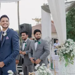 The groom's emotional reaction as he sees his bride walking down the aisle for the first time at their Christian wedding.