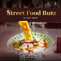 A delightful serving of Paapdi Chaat in a crystal bowl. The combination of crunchy paapdi, creamy yogurt, and tangy chutneys creates a burst of flavour in every bite.