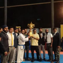Celebrating the successful completion of our 13th state-level inter-dojo karate championship. Holding this trophy represents the collective effort of our entire team.