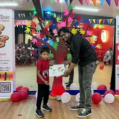 Another happy student receiving his certificate on stage. The joy on their faces is the biggest reward for us as instructors.