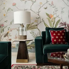 A closer look at the nature-inspired mural, where the delicate, hand-illustrated branches and flowers create a sense of depth and tranquility.