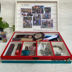 The inside of this personalized organizer box features a photo collage of special memories, making it a truly heartfelt gift. The compartments help keep makeup and jewelry tidy.