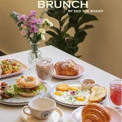 This is what brunch dreams are made of. A table filled with choices like our classic bagel sandwich, sunny-side-up eggs with hash browns, flaky croissants, and avocado toast.