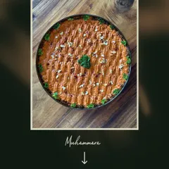 A Levantine classic, done my way. This is my housemade Muhammara, a rich and smoky dip made from roasted red peppers and walnuts, presented in a beautiful bowl ready for serving.