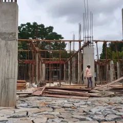 The ground floor structure begins to take shape at the Campus Biovet project. The random rubble foundation work is visible, showcasing the early stages of construction before the columns rise.