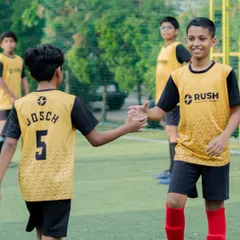 A handshake between teammates shows the sportsmanship and respect we instill in our players from a young age.