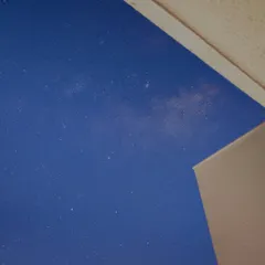 A glimpse of the Milky Way as seen from Pune, a rare sight captured between the geometric lines of a building.