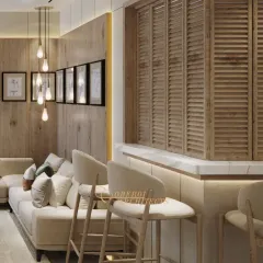 A custom-designed bar and seating area adjacent to the living room. The louvered wooden shutters and warm backlighting create an inviting spot for casual conversations.