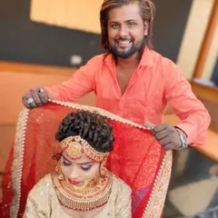 Posing with a bride after completing her look. I take pride in making sure every bride feels confident and beautiful, with a hairstyle and makeup that enhances her natural features.