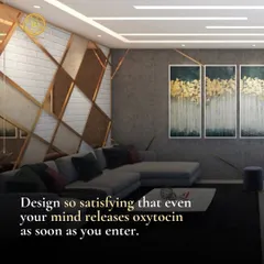 This is a design that feels deeply satisfying. The combination of textured walls, metallic accents, and plush seating creates a living space that soothes the mind and welcomes you in.