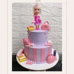 This two-tiered Barbie-themed cake is all about style and fun. Decorated in pink and lavender with edible miniature bags and accessories, it's perfect for a little fashionista's birthday party.
