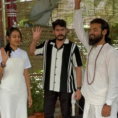 A powerful moment of shared energy with Yoga Guru Prashant Ji and a participant during a paranormal illusion. This is where magic meets healing and spirituality.