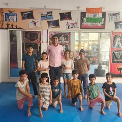 A group photo with my junior batch inside the dojo. This is the next generation of fighters.