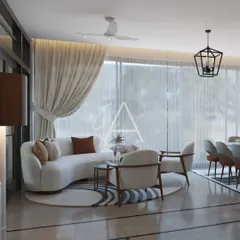 Another view of the open-plan space, showing the relationship between the living and dining areas. The consistent color palette and flooring create a cohesive flow, while distinct furniture pieces define each zone.