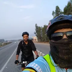 Cruising down the highway during a long-distance ride. These early morning journeys are about endurance and teamwork.
