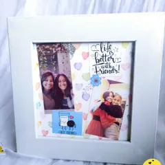 This 5x5 inch square frame is a custom layout for a best friend, with photos, heart-themed paper, and the quote "Life is better with friends!"