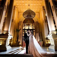 A portrait of modern royalty. We framed Sahib and Muskan against the magnificent architecture, using dramatic lighting to create a sense of grandeur and timelessness. This is how we turn wedding portraits into cinematic art.