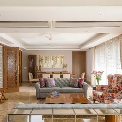 We believe in creating spaces that honor your story. In this New Delhi home, we blended contemporary comfort with heritage by designing custom jaali-inspired partitions, creating a living area that feels both modern and deeply rooted in Indian tradition.