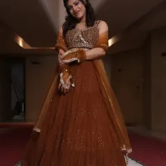 In a traditional lehenga for a special occasion. I love embracing different styles, from formal advocate attire to festive Indian wear.