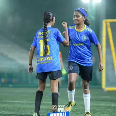 Sisterhood on the pitch. Our girls support and celebrate each other, building strong bonds through the beautiful game.