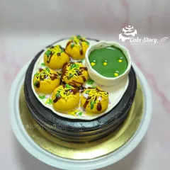 A top-down view of my super popular Pani Puri themed cake. Every element, from the 'puris' to the 'pani', is completely edible and handcrafted for the ultimate foodie surprise.