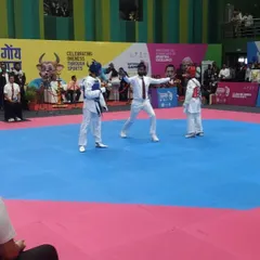 Here I am officiating a match at the 37th National Games. This role requires intense focus and a complete understanding of the sport's regulations.