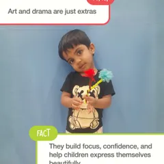There is a myth that art and drama are just extras. The fact is, they are powerful tools that build focus, confidence, and help children express themselves in beautiful ways. This little boy proudly holds his creative work.