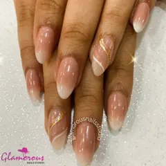 A beautiful and subtle ombré, fading from a soft pink to a milky white tip, with an elegant gold swirl on the accent nails for a touch of luxury.