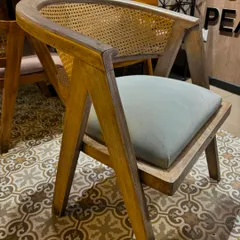 I also craft furniture for commercial spaces. These classic cane chairs with a sturdy wooden frame and comfortable cushion were custom-made for a cafe in Delhi, designed to be both stylish and durable.