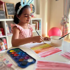 This little bunny is painting a beautiful sunset with watercolors. We teach simple techniques that allow kids to create stunning effects with ease.