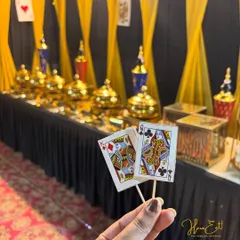 A close-up of the card-themed food toppers used for our Diwali party catering, showing our attention to the smallest details.
