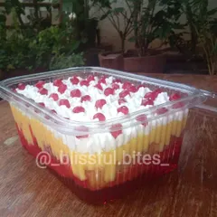 My Mixed Fruit Trifle, a layered dessert that's always a hit at parties. It's packed with fruit, jelly, and custard for a delightful treat.