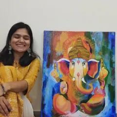 I love creating art that feels personal and joyful. Here I am with a custom Ganesha painting, commissioned as a housewarming gift. The vibrant, abstract style and rich colors were chosen to bring positive energy and a modern touch to my client's new home.