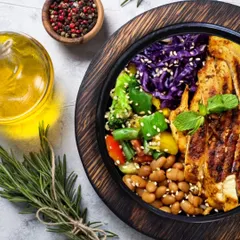 I believe in using fresh, honest ingredients. This high-protein bowl is a testament to that philosophy, featuring grilled chicken, beans, and vibrant veggies, seasoned to perfection.