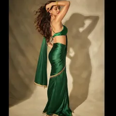 A stunning Diwali look for Disha Patani. I styled her hair with voluminous, windswept waves to add drama to this gorgeous green saree, creating a festive and glamorous vibe.