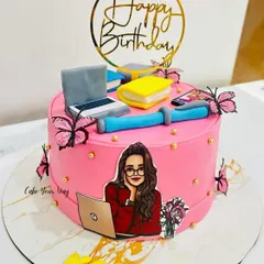 Study vibes, birthday edition. This custom cake was made for a true multitasker, with a fondant laptop, books, and glam butterflies.