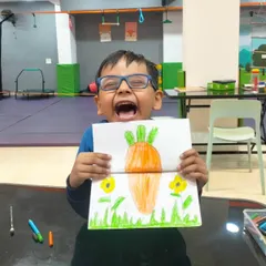 The pure excitement of finishing your artwork. This little ninja is thrilled with his pop-up bunny card, and his infectious joy is what my workshops are all about.