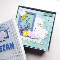 Welcoming a new baby is pure joy, and this scrapbook was made to capture just that. I designed this keepsake book with a fun shaker window and adorable baby boy theme, creating a special place to save all those precious first moments.