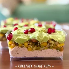 I love giving classic Indian street food a modern twist. My Chatpata Chaat Cups are a perfect example. They feature layers of tangy kokum yogurt, zesty mint cilantro chutney, sprouted moong, and sweet corn, all topped with pomegranate seeds for a burst of flavor and texture.
