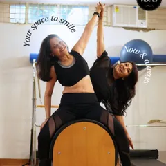 This is your space to smile, now and always. We believe that fitness should bring you joy. Here I am sharing a happy moment with a client, because we love smiling through the stretch.