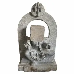 'Leftover' by Dayananda N. This sculpture, combining soft stone and concrete, is a commentary on heritage and modernity. The artist questions what is preserved and what is erased by replacing the deity's head with a concrete block.