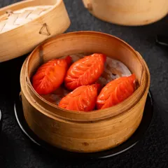 These vibrant red, leaf-shaped dumplings are visually striking. A unique item like this needs a high-quality photo to encourage customers to try something new.
