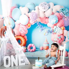 The pure, unfiltered joy of a first birthday cake smash! This is what it's all about: celebrating milestones with laughter, a little bit of mess, and a whole lot of fun in my colorful studio setup.