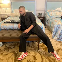 Setting up for a high-profile event at the Versace in Dubai. For destination weddings, I bring my professional Pioneer console to ensure flawless sound quality, no matter where we are in the world.