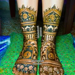 Bridal beauty extends to the feet. Here is a royal bridal foot design with intricate peacock motifs and palace-style architecture, ensuring every detail of your look is perfect from head to toe.