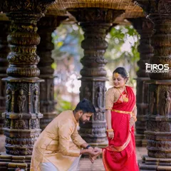 A tender moment in our stone pillar hall, with the groom-to-be adjusting his bride's jewelry.